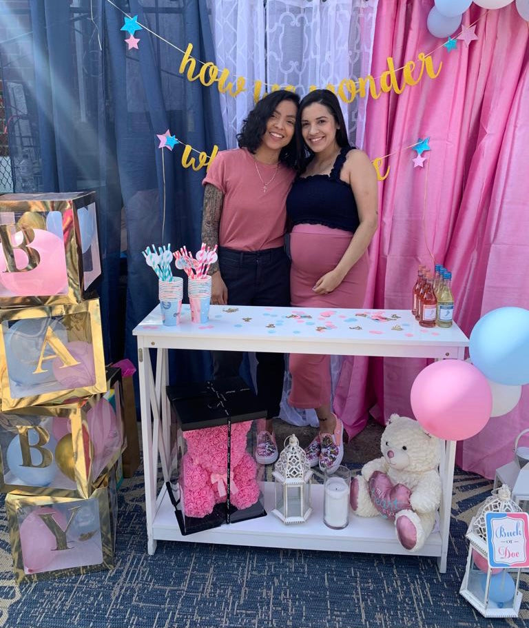 Mama's-to-be share sweet moment at gender reveal party