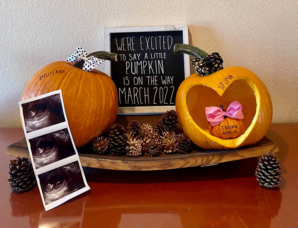 Mosie Baby announcement with sonogram, two pumpkins, one with heart hollowed out with a tiny pumpkin inside indicating pregnancy.